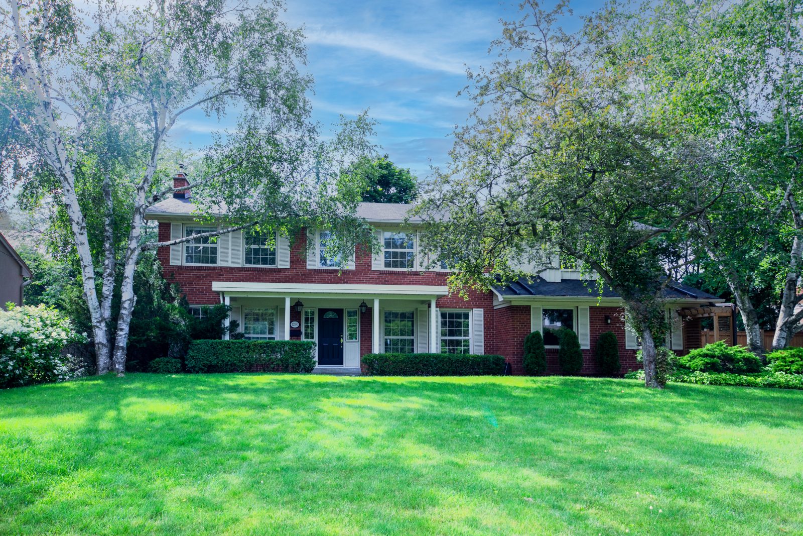 Front lawn and mature trees