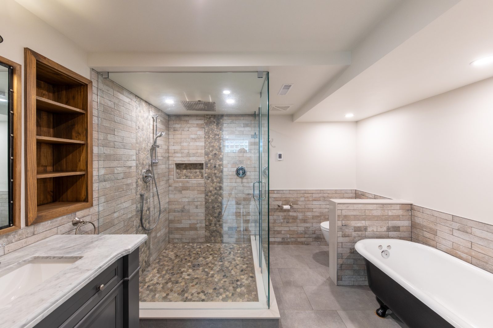 Renovated four-piece lower-level bath