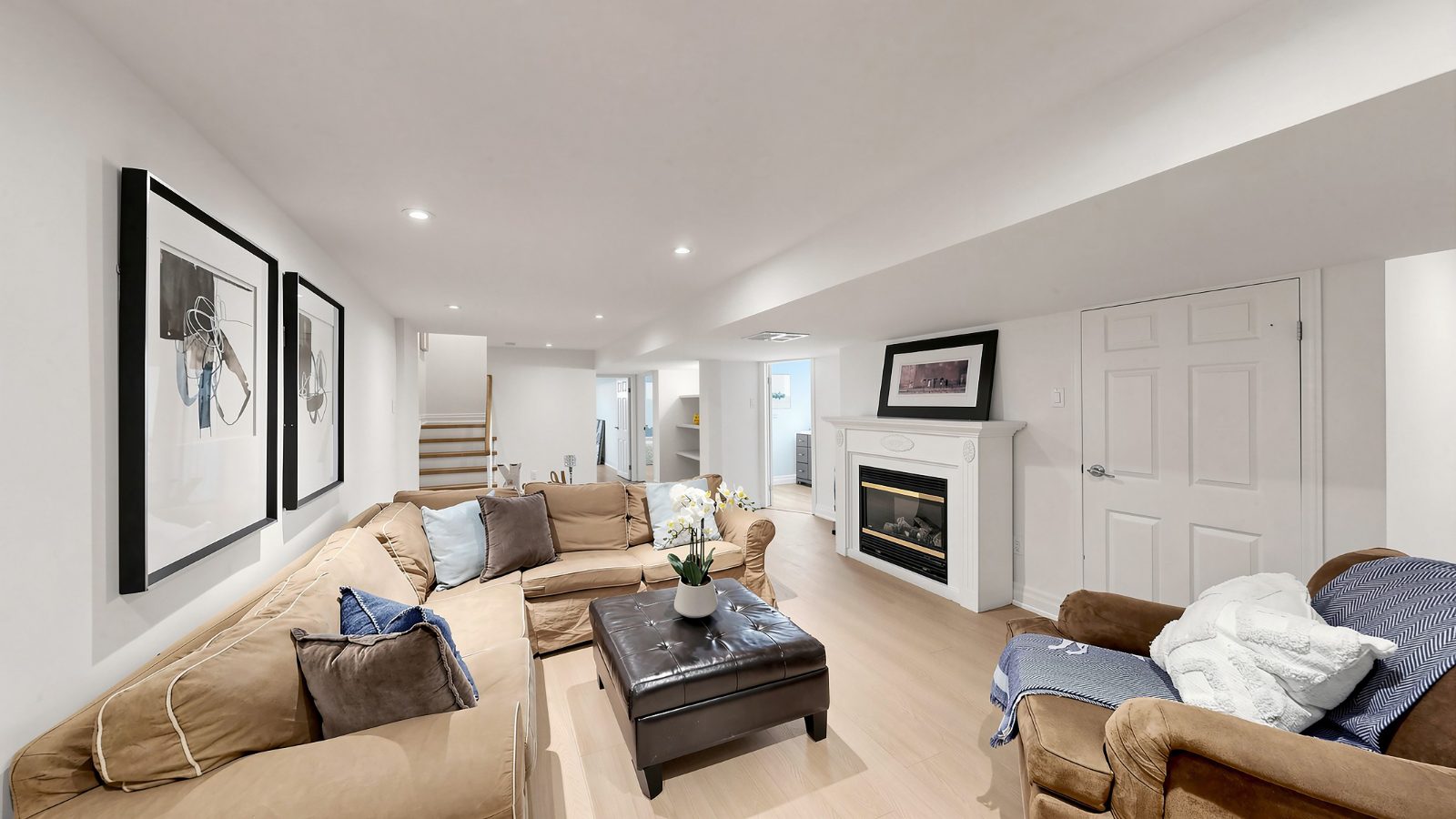 Basement rec room with fireplace