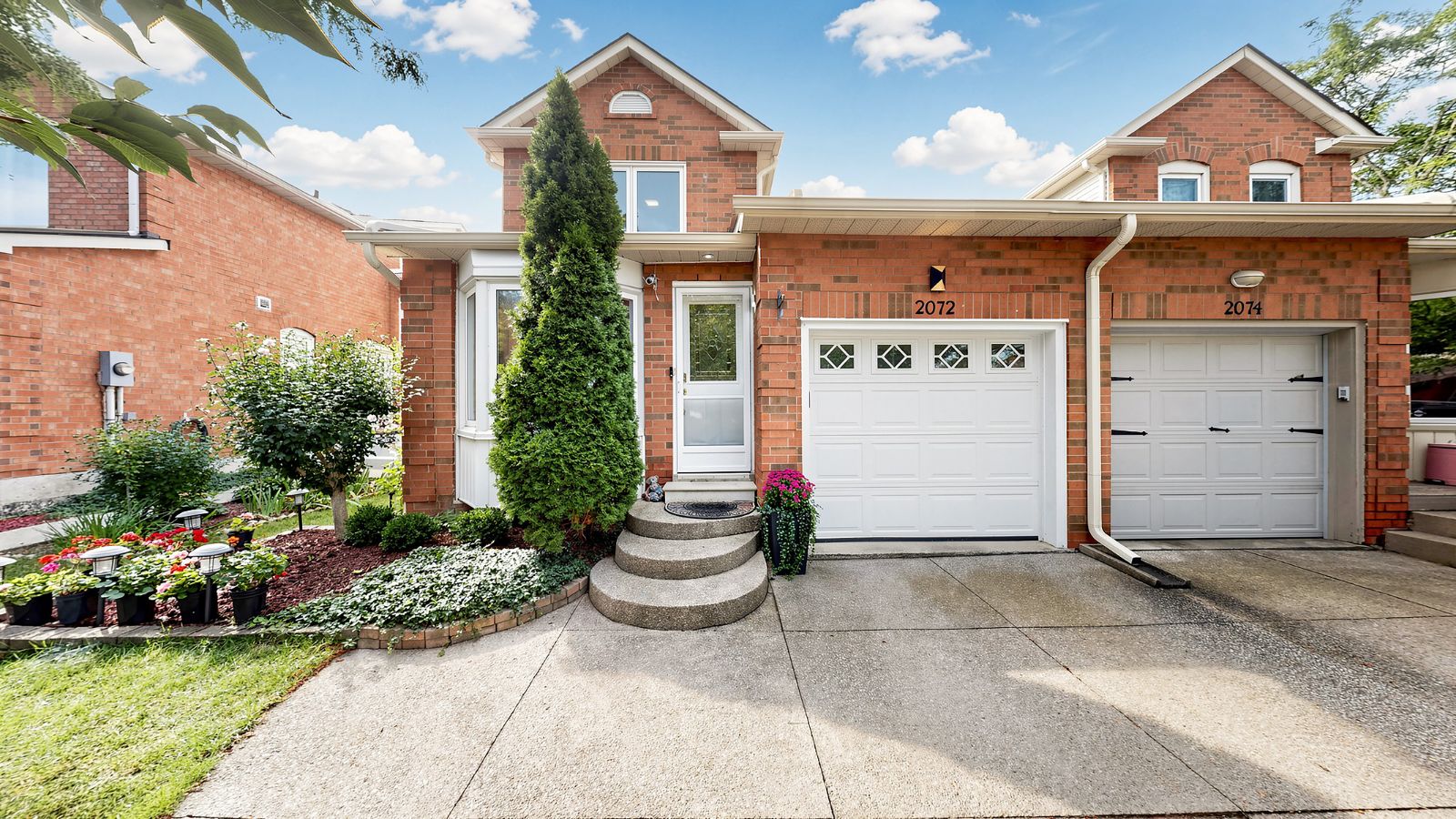 Driveway and garage — linked only by the garage