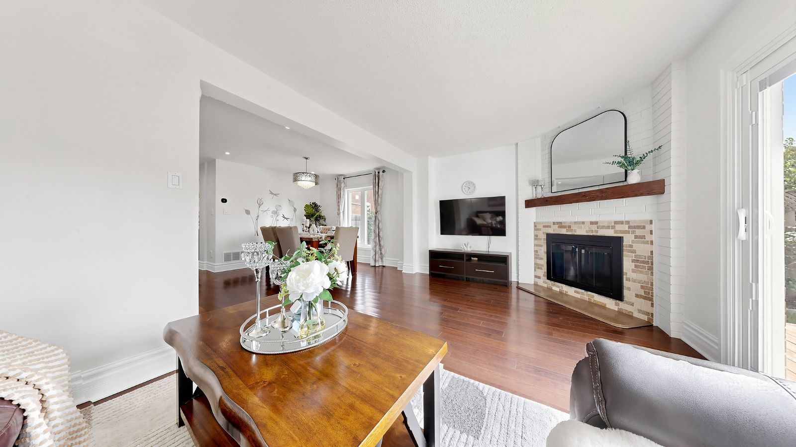Living room with wood-burning fireplace