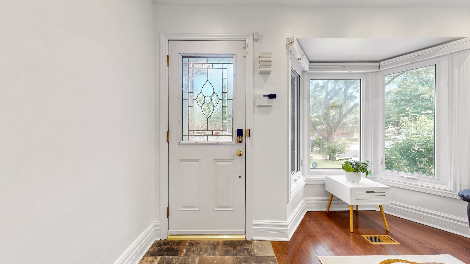 Entry into the breakfast room, bay window