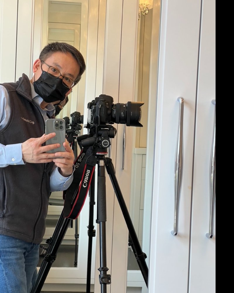 Bob Wang photographing a listing